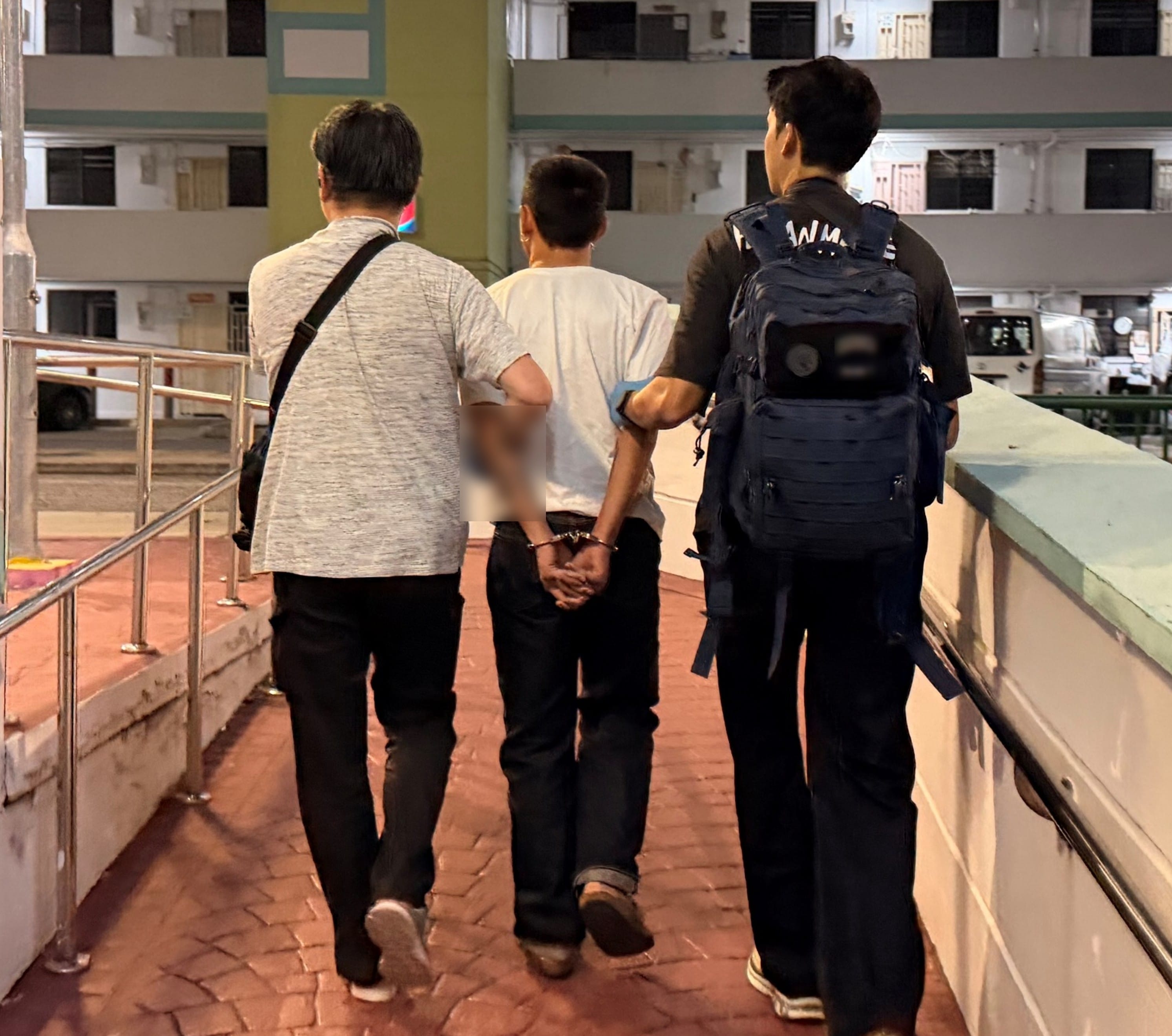 Photo 3 (CNB): A suspected drug offender arrested by CNB officers during an island-wide drug operation from 5 to 9 October 2026.